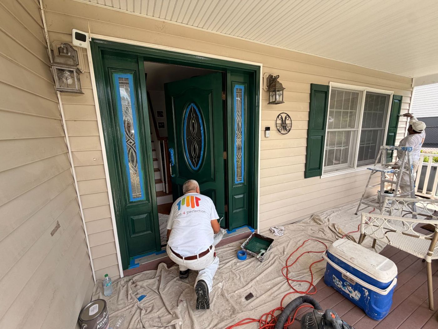 Painter finishing an entry door